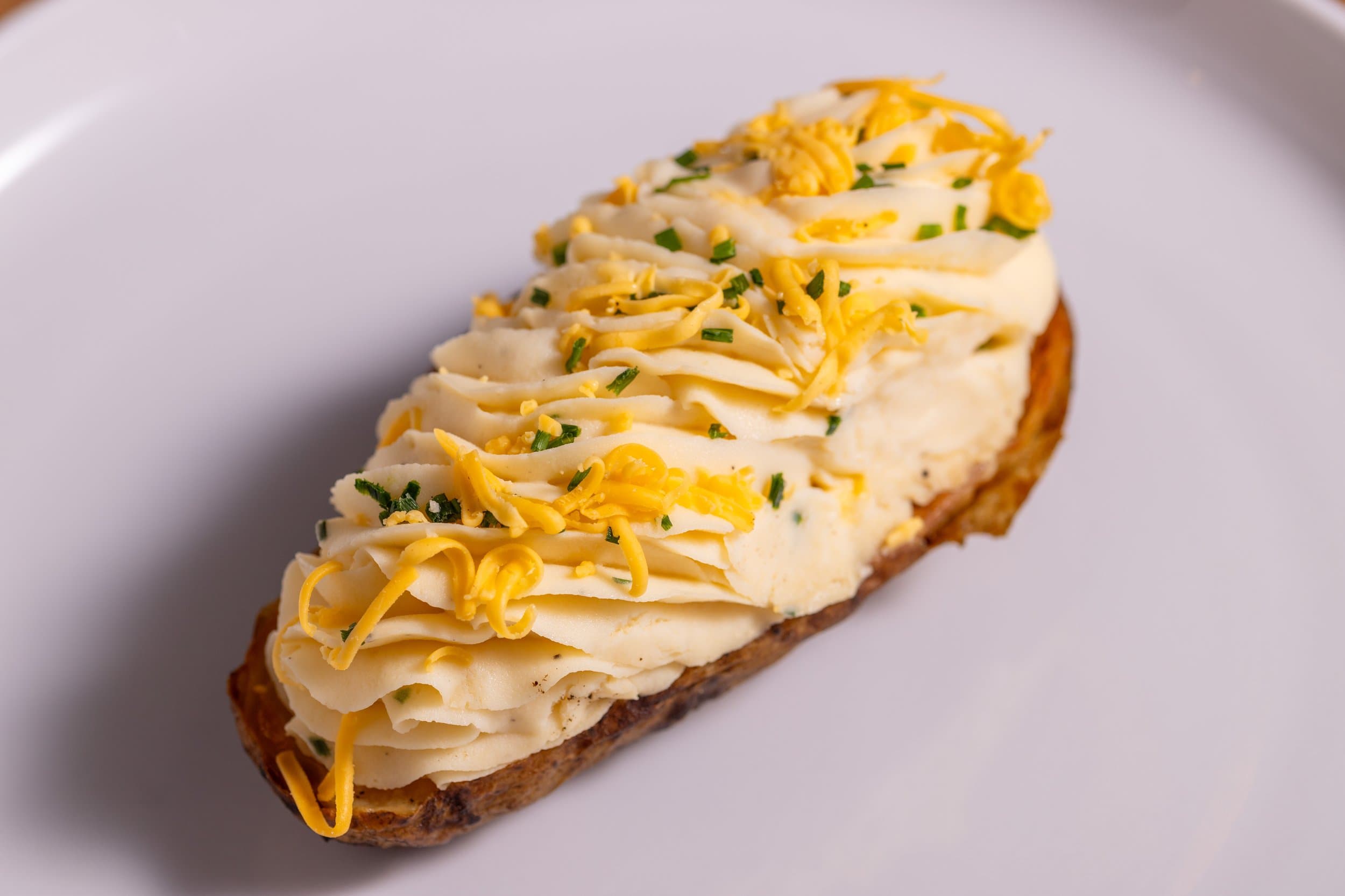 Clines Custom Meats Twice Baked Potato.jpg
